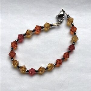 Swarovski Crystal Faceted Bracelet In Vibrant Red, Orange & Gold